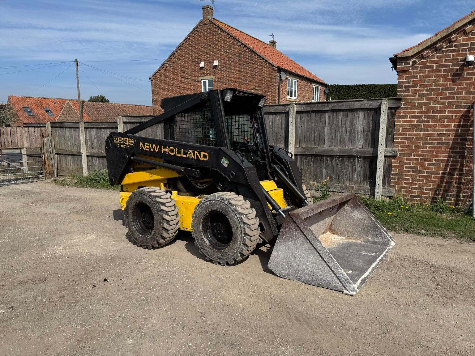1996 New Holland LX885 Turbo Skid steer c/w Bucket & Forks