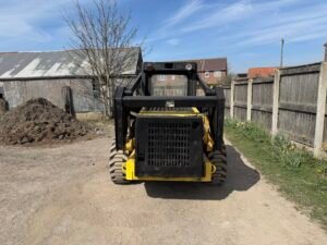 1996 New Holland LX885 Turbo Skid steer c/w Bucket & Forks